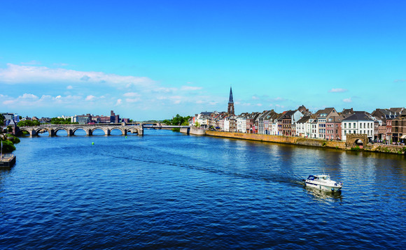 The Dutch city of Maastricht and the Maas River on a summer's day, illustrating a story about Huawei partner AnyLinQ