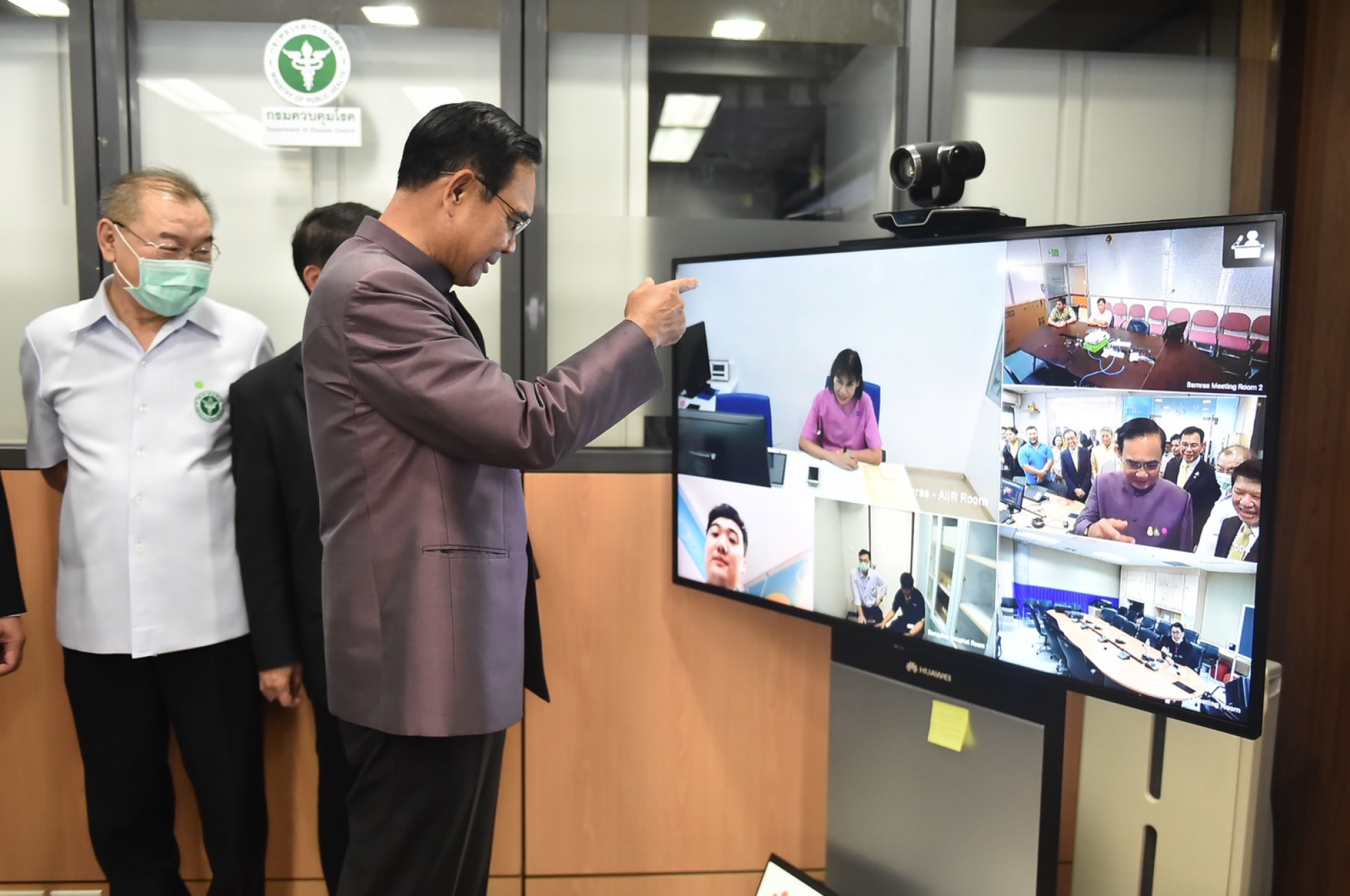A Thai official testing a Telemedicine Video Conference Solution, donated by Huawei to combat COVID-19