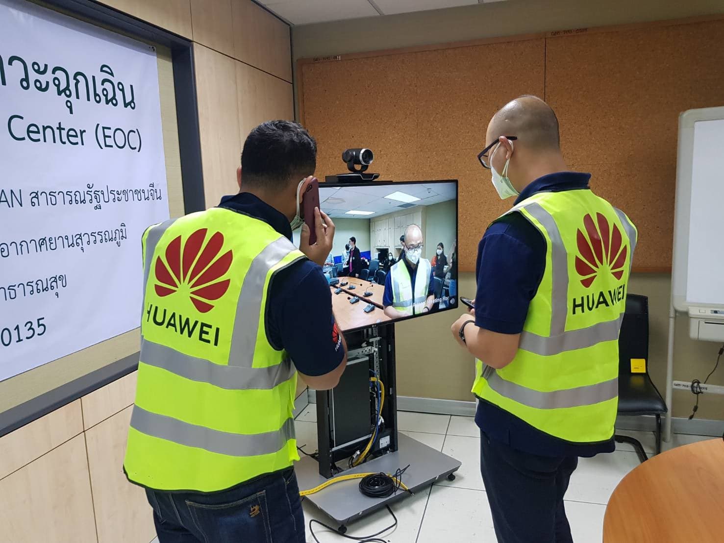 Two Huawei engineers set up a Telemedicine Video Conference Solution, donated to Thailand by Huawei to combat COVID-19