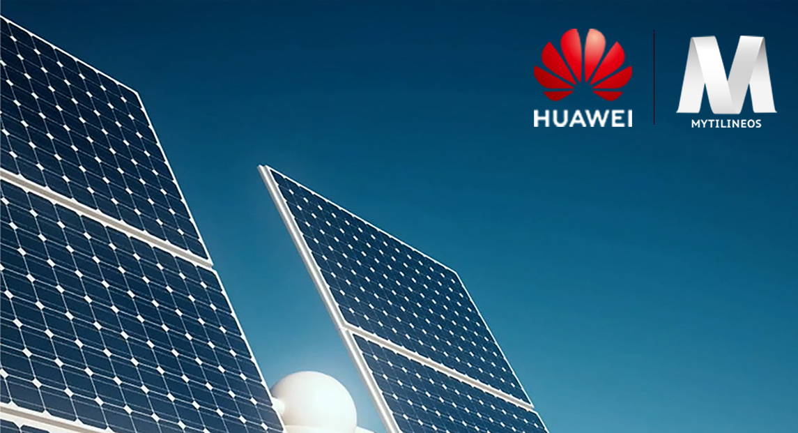 A cropped view of two Photovoltaic (PV) panels against a blue sky, with the logos of Huawei and Greece's MYTILINEOS