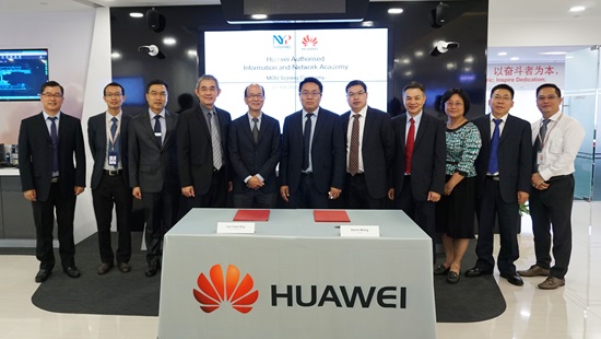 Representatives from Huawei and Nanyang Polytechnic posing for a photo to mark an agreement to set up an ICT Academy