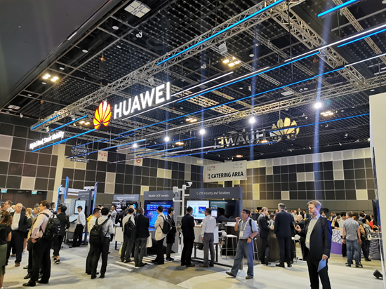 Visitors gather in and around Huawei's booth — themed Digital Road, Smart Mobility — at ITS World Congress 2019