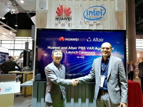 Huawei's Wu Mo and Altair's Piush Patel shake hands in a show of collaboration between the two parties